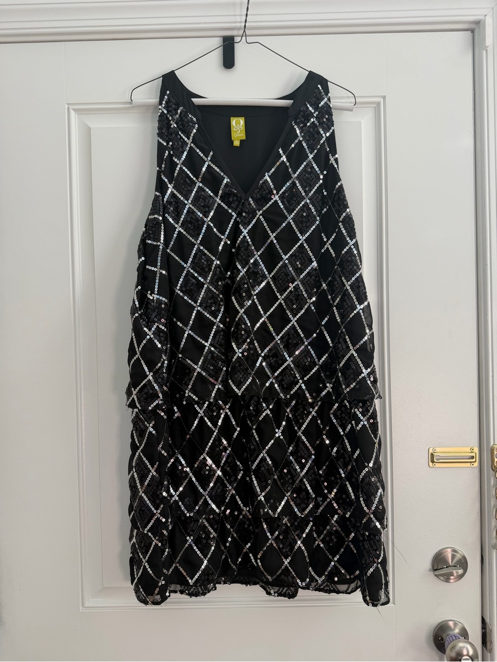 QMack Black Garment with Yellow Logo Tag